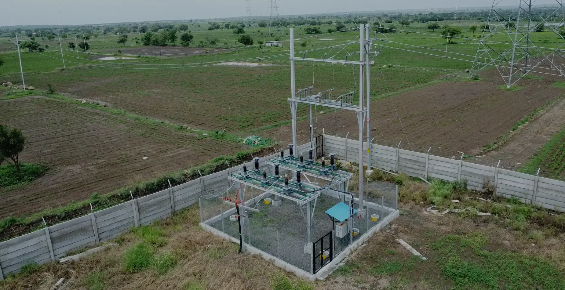 A solar park switchyard and substation built by Kalpa Power in rural Maharashtra